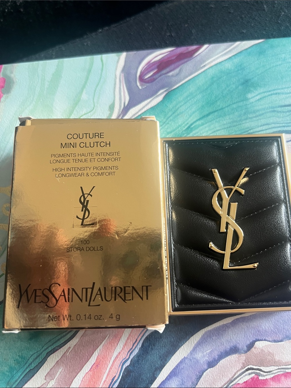 Yves Saint Laurent Black Leather Mini Clutch with Gold YSL Logo eye shadow